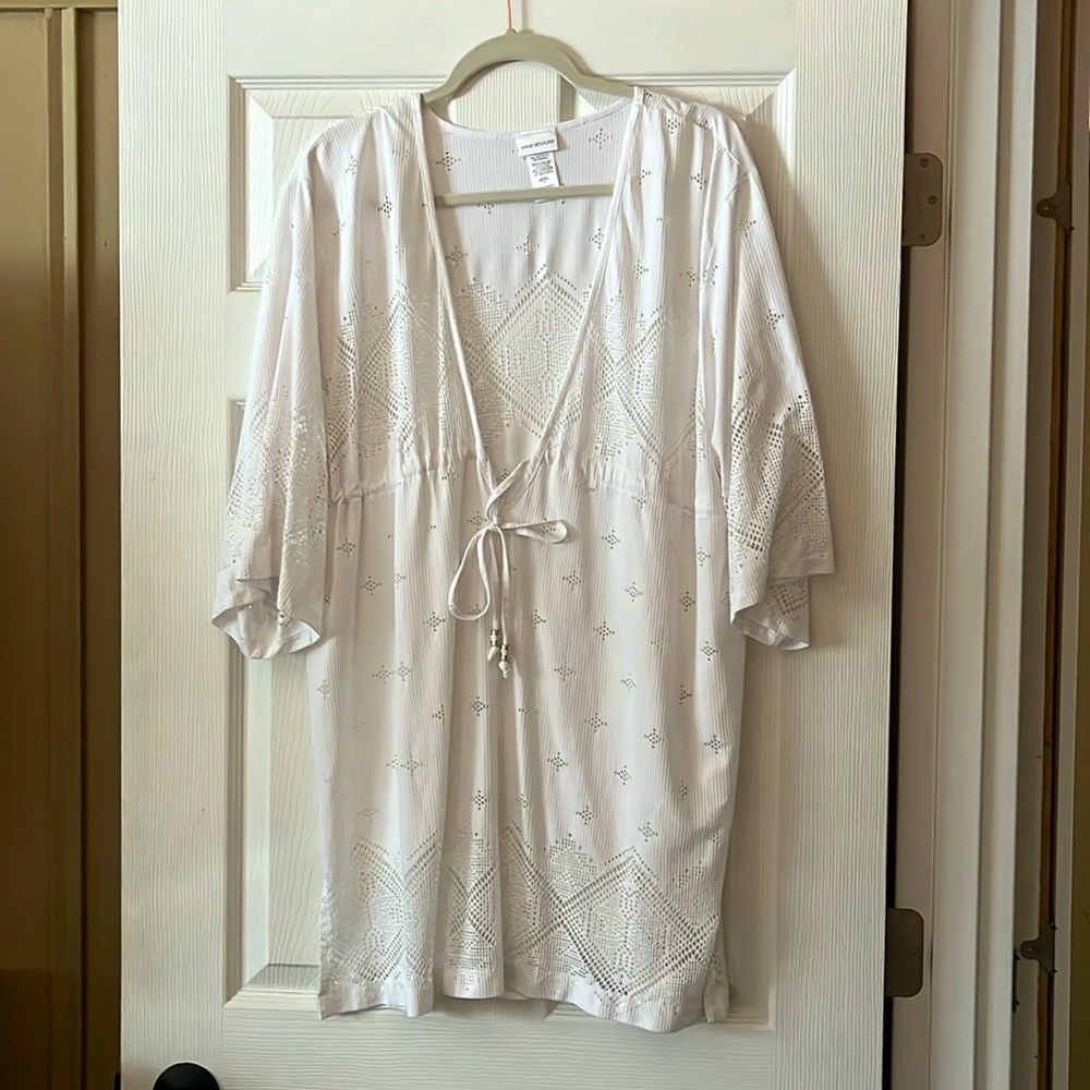 White swim cover-up. Above the knee length, very flattering. No stains or snags.